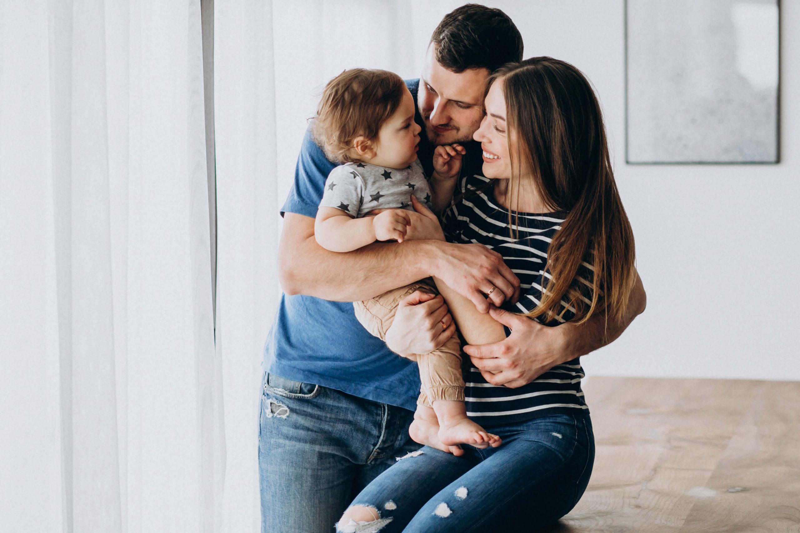 young-family-with-their-little-son-home-2